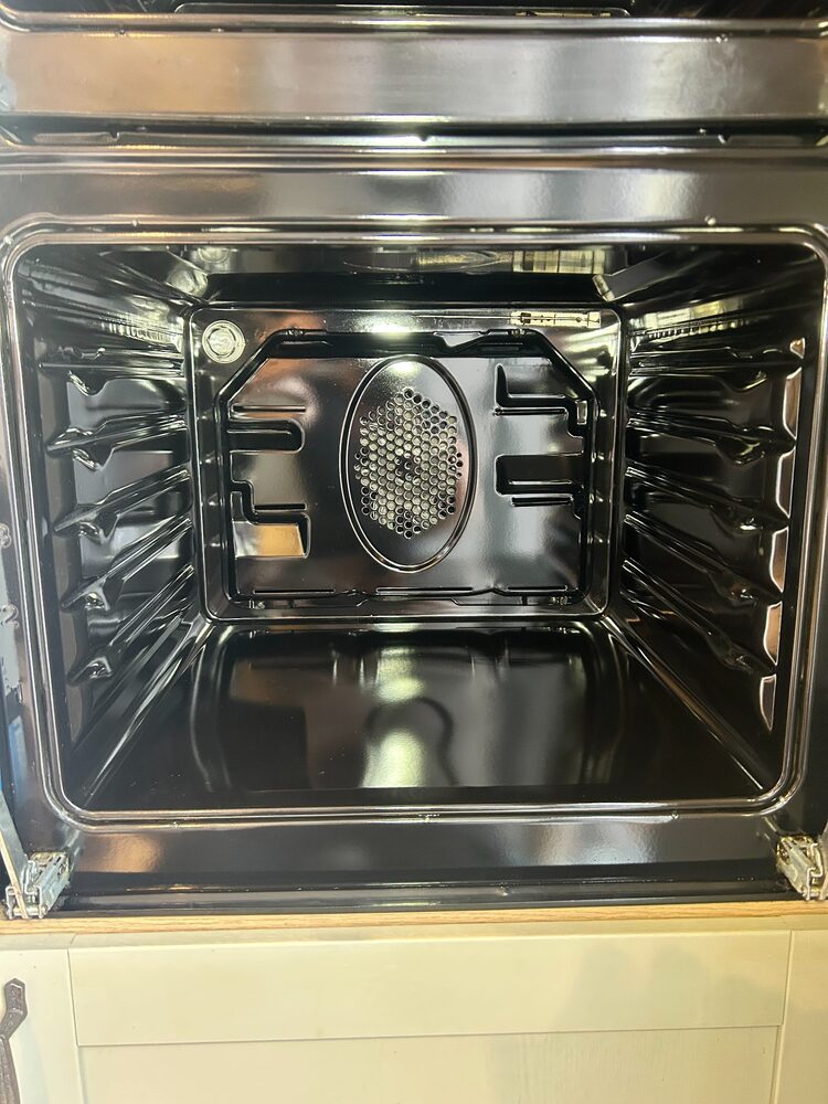Clean oven interior showing a bright, detailed finish
